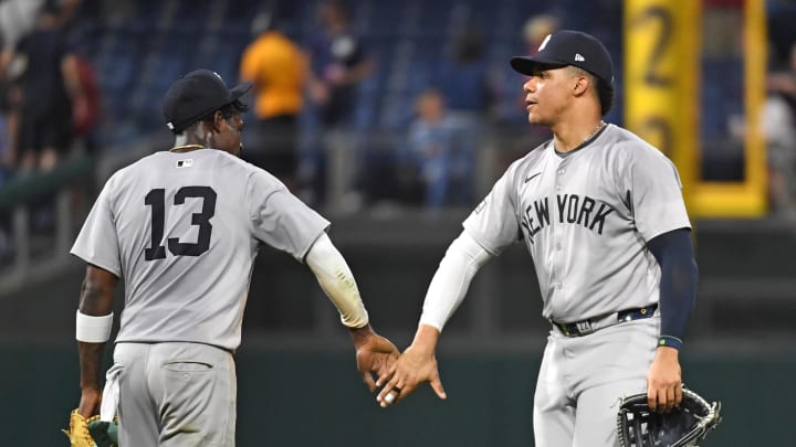 Jul 29, 2024; Philadelphia, Pennsylvania, USA; New York Yankees third baseman Jazz Chisholm, Jr (13) and outfielder Juan Soto (22) celebrate win against the Philadelphia Phillies at Citizens Bank Park. Mandatory Credit: Eric Hartline-USA TODAY Sports