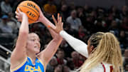 USC Trojans forward Kiki Iriafen (44) guards UCLA Bruins forward Angela Dugalić (32) during the first half of the 2025 TIAA Big Ten Women's Basketball Tournament final game on Sunday, March 9, 2025, at Gainbridge Fieldhouse in Indianapolis. UCLA defeated USC 72-67.