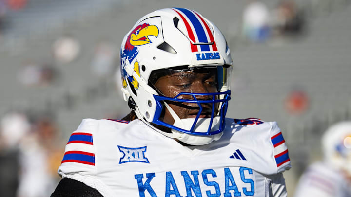 Oct 5, 2024; Tempe, Arizona, USA; Kansas Jayhawks defensive end Jereme Robinson (90) against the Arizona State Sun Devils at Mountain America Stadium. Mandatory Credit: Mark J. Rebilas-Imagn Images