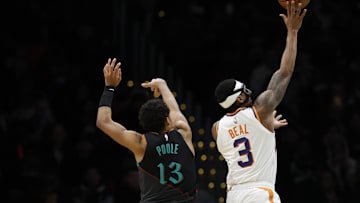 Feb 4, 2024; Washington, District of Columbia, USA; Phoenix Suns guard Bradley Beal (3) shoots the ball as Washington Wizards guard Jordan Poole (13) defends in the second half at Capital One Arena. Mandatory Credit: Geoff Burke-Imagn Images