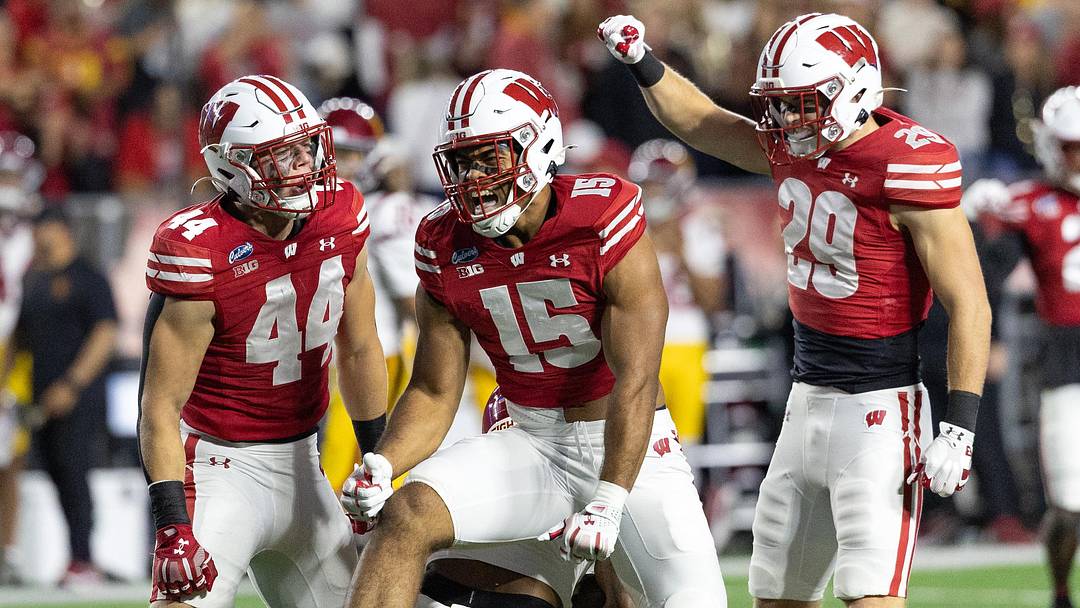 Wisconsin Badgers outside linebacker Sebastian Cheeks (15), linebacker Cooper Catalano (44) and safety Matt Jung (29). Wisconsin Badgers outside linebacker Sebastian Cheeks (15), linebacker Cooper Catalano (44) and safety Matt Jung (29).