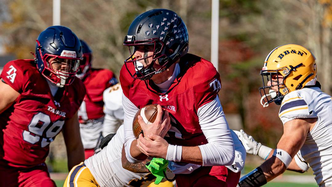 Tabor Academy's quarterback Peter Bourque runs in a touchdown on the opening drive against the BB&N Knights . JOSH SOUZA/STANDARD-TIMES SPECIAL Tabor Academy's quarterback Peter Bourque runs in a touchdown on the opening drive against the BB&N Knights . JOSH SOUZA/STANDARD-TIMES SPECIAL