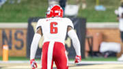 Sep 11, 2025; Winston-Salem, North Carolina, USA;  Wake Forest Demon Deacons wide receiver Sterling Berkhalter (4) lines up in the first half against North Carolina State Wolfpack cornerback Devon Marshall (6) at Allegacy Federal Credit Union Stadium. Mandatory Credit: Luke Jamroz-Imagn Images