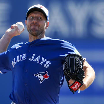 Mar 2, 2025; Dunedin, Florida, USA; Toronto Blue Jays pitcher Max Scherzer (31) throws a pitch against the Philadelphia Phillies in the second inning during spring training at TD Ballpark. 