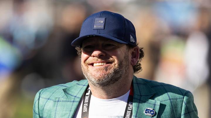 Seattle Seahawks general manager John Schneider looks on