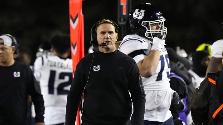 Oct 22, 2022; Laramie, Wyoming, USA; Utah State Aggies head coach Blake Anderson reacts during the first quarter against the Wyoming Cowboys at Jonah Field at War Memorial Stadium. Mandatory Credit: Troy Babbitt-USA TODAY Sports