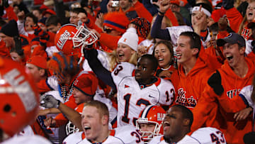 Nov 10, 2007; Columbus, OH, USA; Illinois Fighting Illini receiver Will Judson (13) celebrates with the student section after a victory against the Ohio State Buckeyes at Ohio Stadium. The Fighting Illini beat the Buckeyes 28-21. Mandatory Credit: Matthew Emmons-Imagn Images