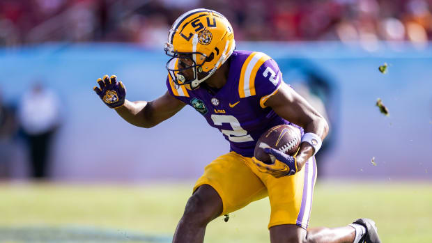 LSU Tigers wide receiver Kyren Lacy catches a pass during a college football game in the SEC.