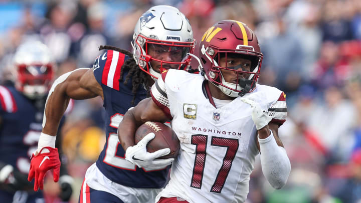 Nov 5, 2023; Foxborough, Massachusetts, USA; Washington Commanders receiver Terry McLaurin (17) runs the ball during the second half against the New England Patriots at Gillette Stadium. Mandatory Credit: Paul Rutherford-USA TODAY Sports