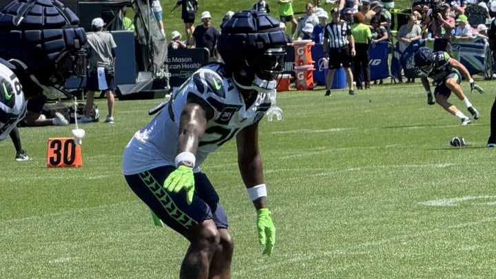 Seattle Seahawks safety K'Von Wallace communicates with cornerback Lance Boykin during a drill at training camp.