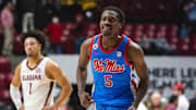 Jan 14, 2025; Tuscaloosa, Alabama, USA; Mississippi Rebels guard Jaylen Murray (5) and Alabama Crimson Tide guard Mark Sears (1) walk off the court following the end of the game at Coleman Coliseum. Mandatory Credit: Will McLelland-Imagn Images