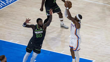 May 20, 2025; Oklahoma City, Oklahoma, USA; Oklahoma City Thunder guard Shai Gilgeous-Alexander (2) shoots against Minnesota Timberwolves forward Julius Randle (30) in the fourth quarter during game one of the western conference finals for the 2025 NBA Playoffs at Paycom Center. Mandatory Credit: Brett Rojo-Imagn Images