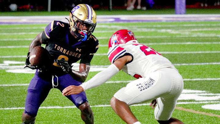Booker's wide receiver Tyren Wortham (#2). Action during the Fred Gilmore Kickoff Classic against the Manatee Hurricanes and Booker Tornadoes in Sarasota on Friday, August. 15, 2025.