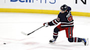 Oct 20, 2024; Winnipeg, Manitoba, CAN; Winnipeg Jets center Cole Perfetti (91) warms up before a game against the Pittsburgh Penguins at Canada Life Centre. Mandatory Credit: James Carey Lauder-Imagn Images