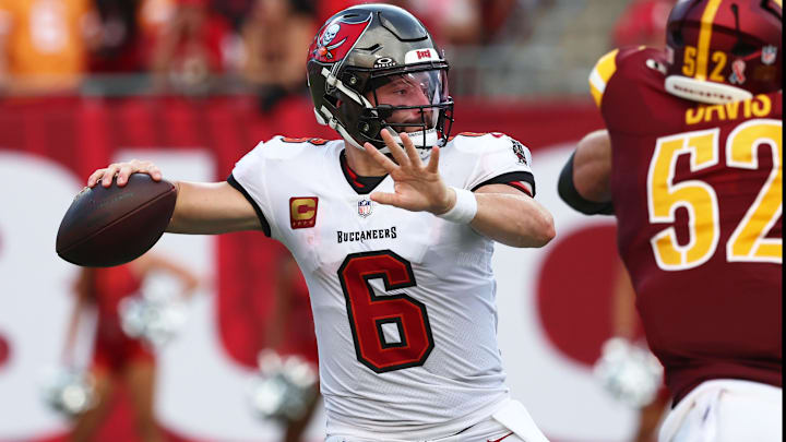 Sep 8, 2024; Tampa, Florida, USA;  Tampa Bay Buccaneers quarterback Baker Mayfield (6) throws the ball against the Washington Commanders during the second half at Raymond James Stadium.Images