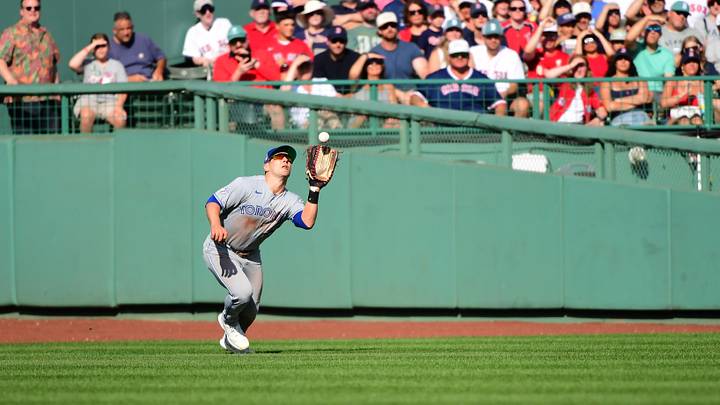 Jul 25, 2026; Boston, Massachusetts, USA;  Toronto Blue Jays center fielder Daulton Varsho (5) makes a catch for an out during the third inning against the Boston Red Sox at Fenway Park. Mandatory Credit: Bob DeChiara-Imagn Images