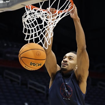 Mar 18, 2024; Dayton, OH, USA; Howard Bison forward Miles Stewart (4) dunks during NCAA Tournament First Four Practice at UD Arena. Mandatory Credit: Rick Osentoski-Imagn Images