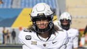 Nov 8, 2025; Morgantown, West Virginia, USA; Colorado Buffaloes quarterback Julian Lewis (10) warms up prior to their game against the West Virginia Mountaineers at Milan Puskar Stadium.
