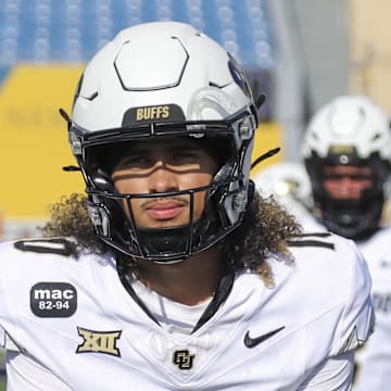 Nov 8, 2025; Morgantown, West Virginia, USA; Colorado Buffaloes quarterback Julian Lewis (10) warms up prior to their game against the West Virginia Mountaineers at Milan Puskar Stadium.