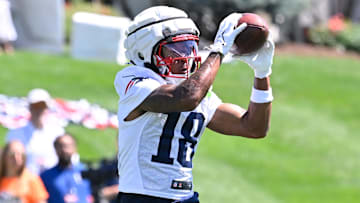 Jul 23, 2025; Foxborough, MA, USA; New England Patriots wide receiver Kyle Williams (18) makes a catch during training camp at Gillette Stadium. Mandatory Credit: Eric Canha-Imagn Images