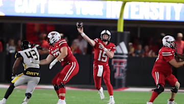 Aug 30, 2025; Lubbock, Texas, USA;  Texas Tech Red Raiders  quarterback Will Hammond (15) passes in the second half against the Arkansas-Pine Bluff Golden Lions at Jones AT&T Stadium. Mandatory Credit: Michael C. Johnson-Imagn Images