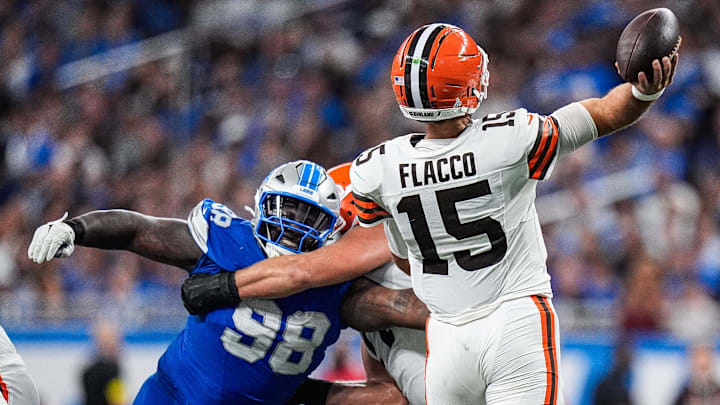 Detroit Lions defensive tackle DJ Reader (98) tries to tackle Cleveland Browns quarterback Joe Flacco (15) during the second half at Ford Field in Detroit on Sunday, Sept. 28, 2025. Detroit Lions defensive tackle DJ Reader (98) tries to tackle Cleveland Browns quarterback Joe Flacco (15) during the second half at Ford Field in Detroit on Sunday, Sept. 28, 2025.