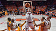 Dec 14, 2024; Champaign, Illinois, USA;  Illinois Fighting Illini forward Ben Humrichous (3) dunks the ball during the second half against the Tennessee Volunteers at State Farm Center. Mandatory Credit: Ron Johnson-Imagn Images