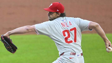 May 9, 2025; Cleveland, Ohio, USA; Philadelphia Phillies starting pitcher Aaron Nola (27) delivers a pitch in the first inning against the Cleveland Guardians at Progressive Field. 