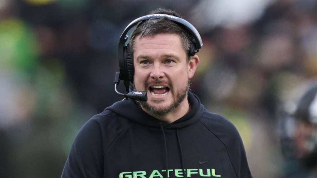 Oct 25, 2025; Eugene, Oregon, USA; Oregon Ducks head coach Dan Lanning instructs players during the first half against the Wisconsin Badgers at Autzen Stadium. Mandatory Credit: Troy Wayrynen-Imagn Images