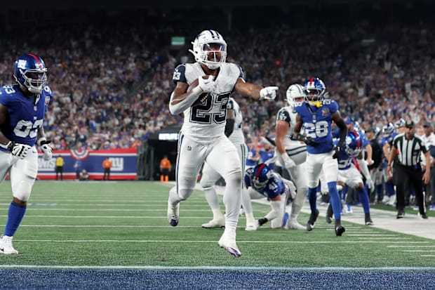 Dallas Cowboys running back Rico Dowdle celebrates his touchdown against the New York Giants.