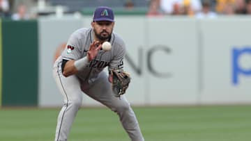 Jul 25, 2025; Pittsburgh, Pennsylvania, USA;  Arizona Diamondbacks third baseman Eugenio Suarez (28) fields a ground ball against Pittsburgh Pirates left fielder Tommy Pham (not pictured) during the fourth inning at PNC Park. Mandatory Credit: Charles LeClaire-Imagn Images