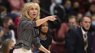 Feb 26, 2022; Stanford, California, USA; Washington Huskies head coach Tina Langley calls in a play to her team during the fourth quarter against the Stanford Cardinal at Maples Pavilion. Mandatory Credit: D. Ross Cameron-Imagn Images