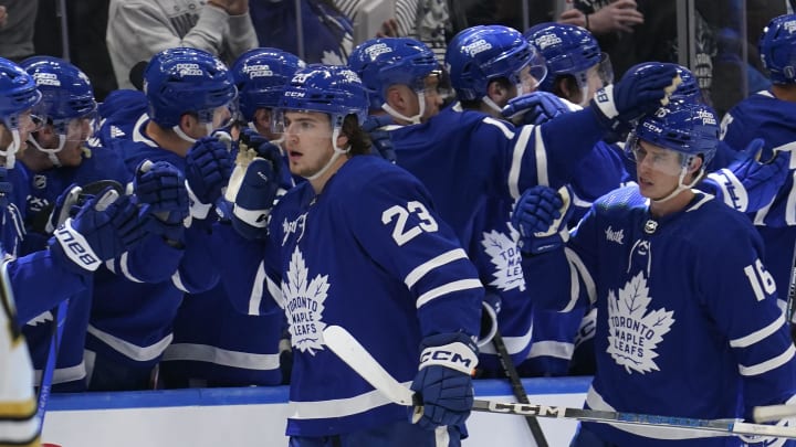 Apr 24, 2024; Toronto, Ontario, CAN; Toronto Maple Leafs forward Matthew Knies (23) gets congratulated after a goal against the Boston Bruins during the second period of game three of the first round of the 2024 Stanley Cup Playoffs at Scotiabank Arena. Mandatory Credit: John E. Sokolowski-USA TODAY Sports