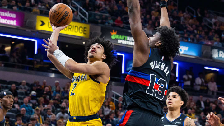 Apr 7, 2023; Indianapolis, Indiana, USA; Indiana Pacers guard Andrew Nembhard (2) shoots the ball while  Detroit Pistons center James Wiseman (13) defends in the first quarter at Gainbridge Fieldhouse. Mandatory Credit: Trevor Ruszkowski-USA TODAY Sports
