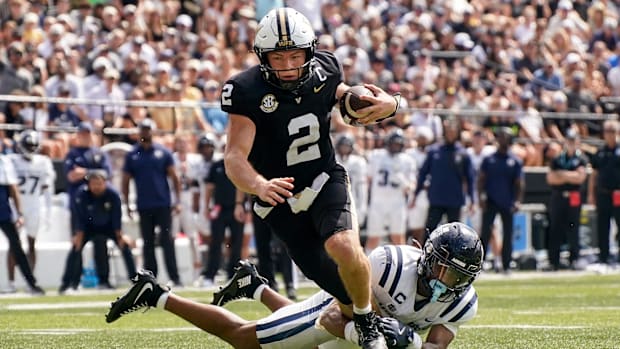 Vanderbilt quarterback Diego Pavia (2) runs in a touchdown