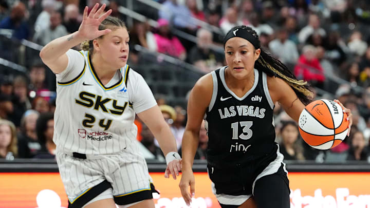 Sep 9, 2025; Las Vegas, Nevada, USA; Las Vegas Aces guard Aaliyah Nye (13) dribbles against Chicago Sky guard Rachel Banham (24) during the fourth quarter at T-Mobile Arena. Mandatory Credit: Stephen R. Sylvanie-Imagn Images