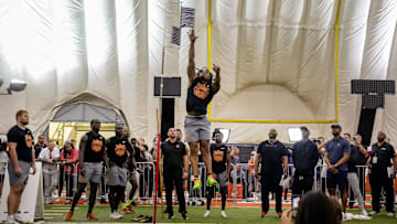 Texas running backJaydon Blue participates in the vertical jump d at the team's pro day on Tuesday. 