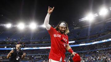 Bo Bichette walking off the field, after hitting a go ahead 2 run home run in the bottom of the 8th inning against the Tampa Bay Rays - Rogers Centre