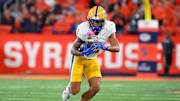 Oct 18, 2025; Syracuse, New York, USA; Pittsburgh Panthers wide receiver Kenny Johnson (2) runs with the ball against the Syracuse Orange during the first half at the JMA Wireless Dome. Mandatory Credit: Rich Barnes-Imagn Images