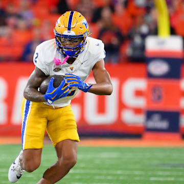 Oct 18, 2025; Syracuse, New York, USA; Pittsburgh Panthers wide receiver Kenny Johnson (2) runs with the ball against the Syracuse Orange during the first half at the JMA Wireless Dome. Mandatory Credit: Rich Barnes-Imagn Images