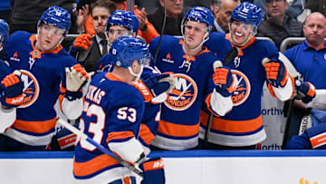 Mar 26, 2025; Elmont, New York, USA;  New York Islanders center Casey Cizikas (53) celebrates his short handed goal against the Vancouver Canucks during the second period at UBS Arena. Mandatory Credit: Dennis Schneidler-Imagn Images