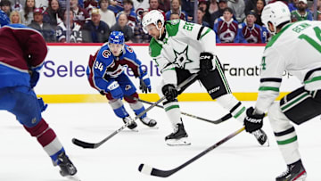 May 1, 2025; Denver, Colorado, USA; Dallas Stars defenseman Alexander Petrovic (28) controls the puck in the first period in game against the Colorado Avalanche six of the first round of the 2025 Stanley Cup Playoffs at Ball Arena. Mandatory Credit: Ron Chenoy-Imagn Images