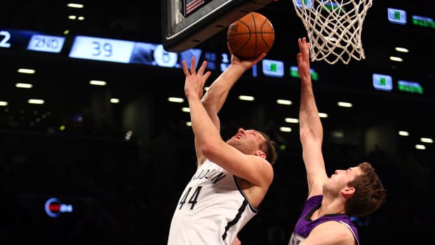 Dec 29, 2014; Brooklyn, NY, USA; Brooklyn Nets shooting guard Bojan Bogdanovic (44) shoots