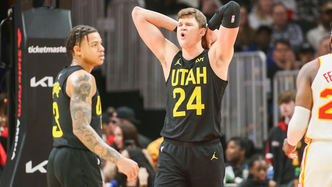 Feb 27, 2024; Atlanta, Georgia, USA; Utah Jazz center Walker Kessler (24) reacts to a foul call against the Atlanta Hawks in the second half at State Farm Arena.