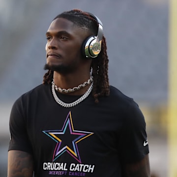 Dallas Cowboys wide receiver CeeDee Lamb (88) walks the field  before a game against the Pittsburgh Steelers at Acrisure Stadium.