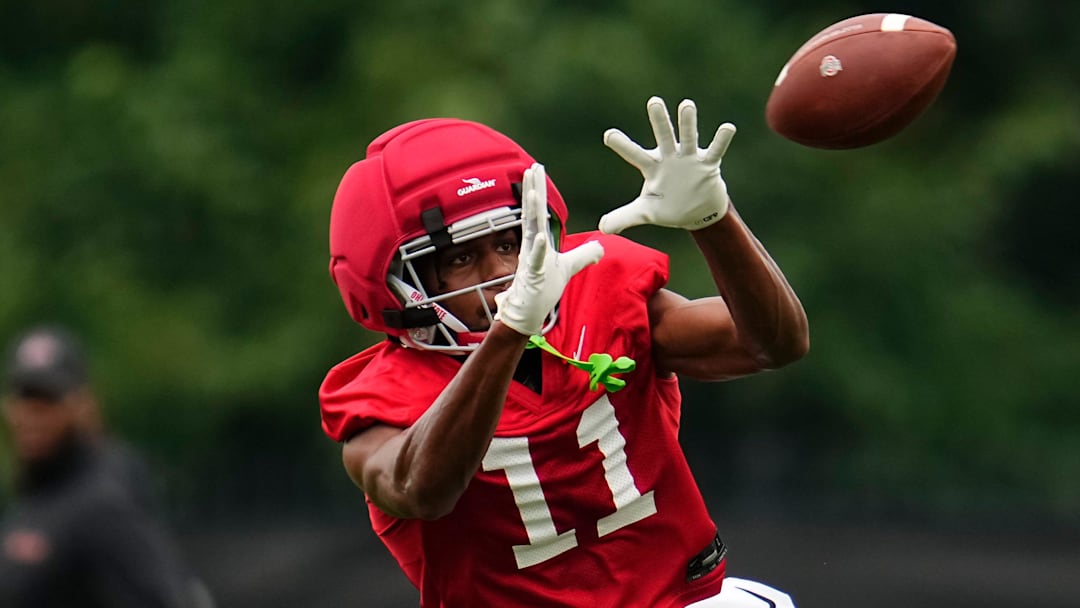 Ohio State Buckeyes wide receiver Quincy Porter (11) catches a pass during the first football practice of the season at the Woody Hayes Athletic Center on July 31, 2025.