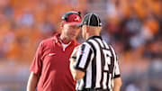 Oct 19, 2024; Knoxville, Tennessee, USA; Alabama Crimson Tide head coach Kalen DeBoer speaks with an official during the first quarter against the Tennessee Volunteers at Neyland Stadium. Mandatory Credit: Randy Sartin-Imagn Images