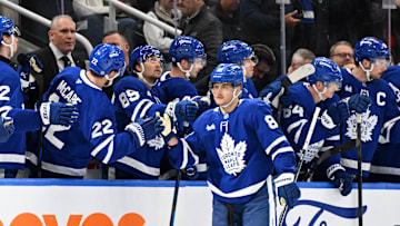 Mar 25, 2025; Toronto, Ontario, CAN;  Toronto Maple Leafs forward William Nylander (88) celebrates with teammates at the bench after scoring a goal against the Philadelphia Flyers in the second period at Scotiabank Arena. Mandatory Credit: Dan Hamilton-Imagn Images