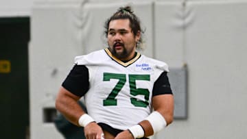 Jun 11, 2025; Green Bay, WI, USA;  Green Bay Packers offensive tackle Sean Rhyan (75) participates in the team's minicamp at Ray Nitschke Field. Mandatory Credit: Benny Sieu-Imagn Images