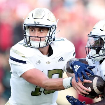 Aug 24, 2024; Dublin, IRL; Georgia Tech quarterback Haynes King hands the ball off to Jamal Haynes at Aviva Stadium. Mandatory Credit: Tom Maher/INPHO via USA TODAY Sports